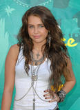 Miley Cyrus leggy in mini skirt at the 2009 Teen Choice Awards