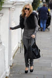 th_56905_KylieMinogue_OutandaboutinLondonNov192010_By_oTTo1_122_404lo.JPG