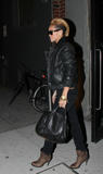 th_88562_Rihanna_looks_fierce_in_a_leather_jacket_04_122_405lo.jpg