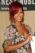 th_60778_RihannasignscopiesofRihannaRihannainNYC27.10.2010_239_122_572lo.jpg